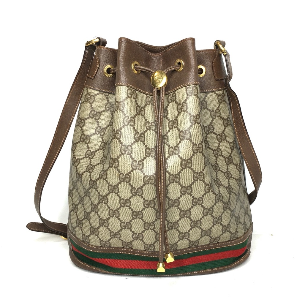 Authentic Gucci brown monogram coated canvas bucket bag